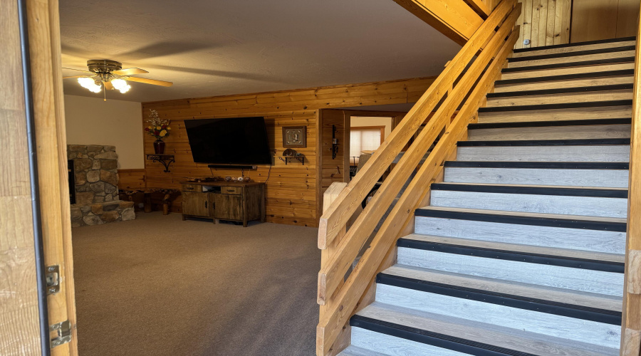Stairs and view of Family Room