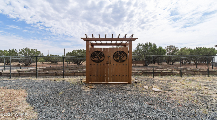 Entry to fenced garden area