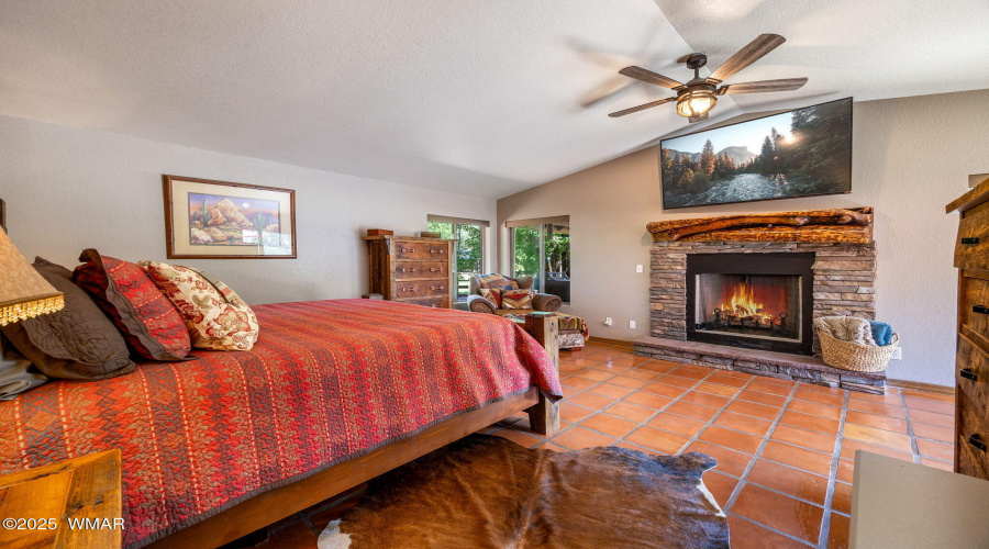 Primary with cozy Fireplace