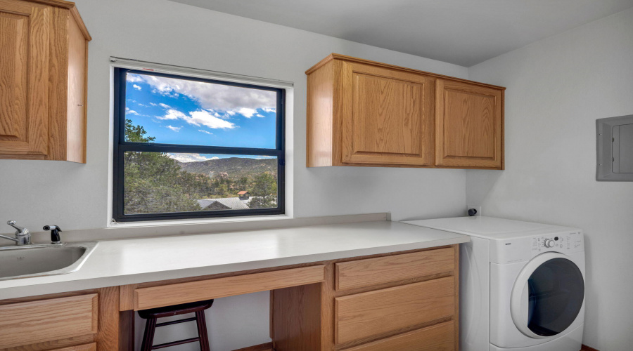 Laundry Room with Cabinets and Countersp
