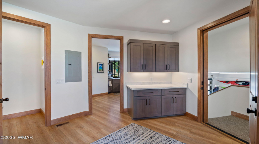 Laundry to living, butler & garage