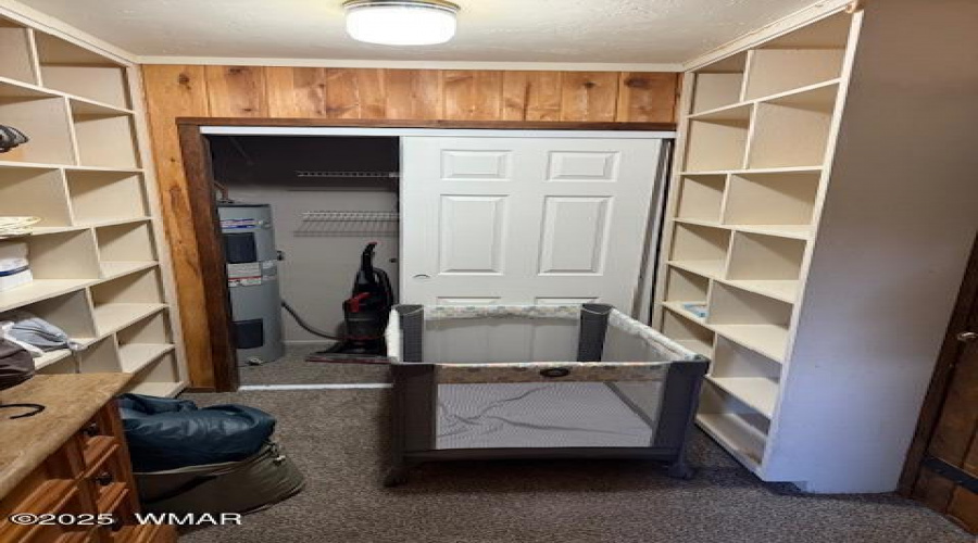 closet with hot water heater