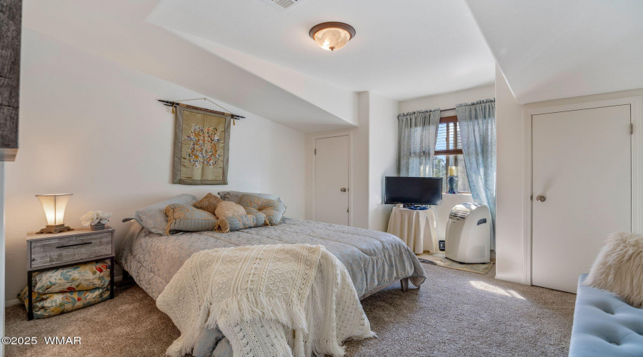 Guest bedroom with picture window